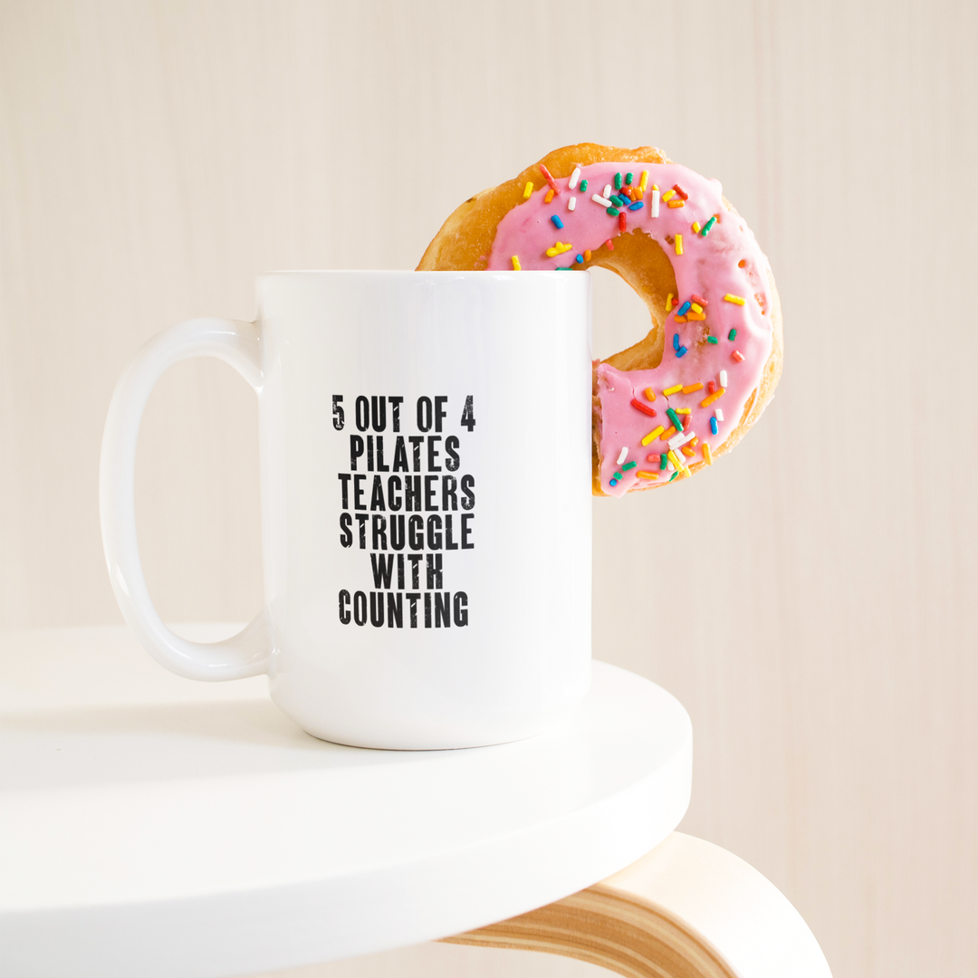 5_out_of_4_15_oz_15ozWhiteMugLifetsyleDonutLH_Mockup.png