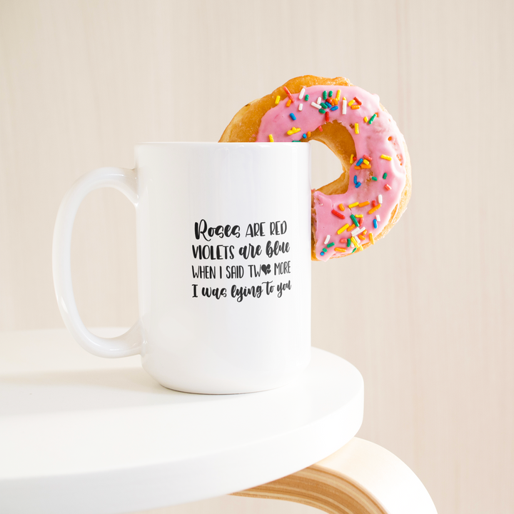Lying_To_You_Coffee_Mug_15ozWhiteMugLifetsyleDonutLH_Mockup.png