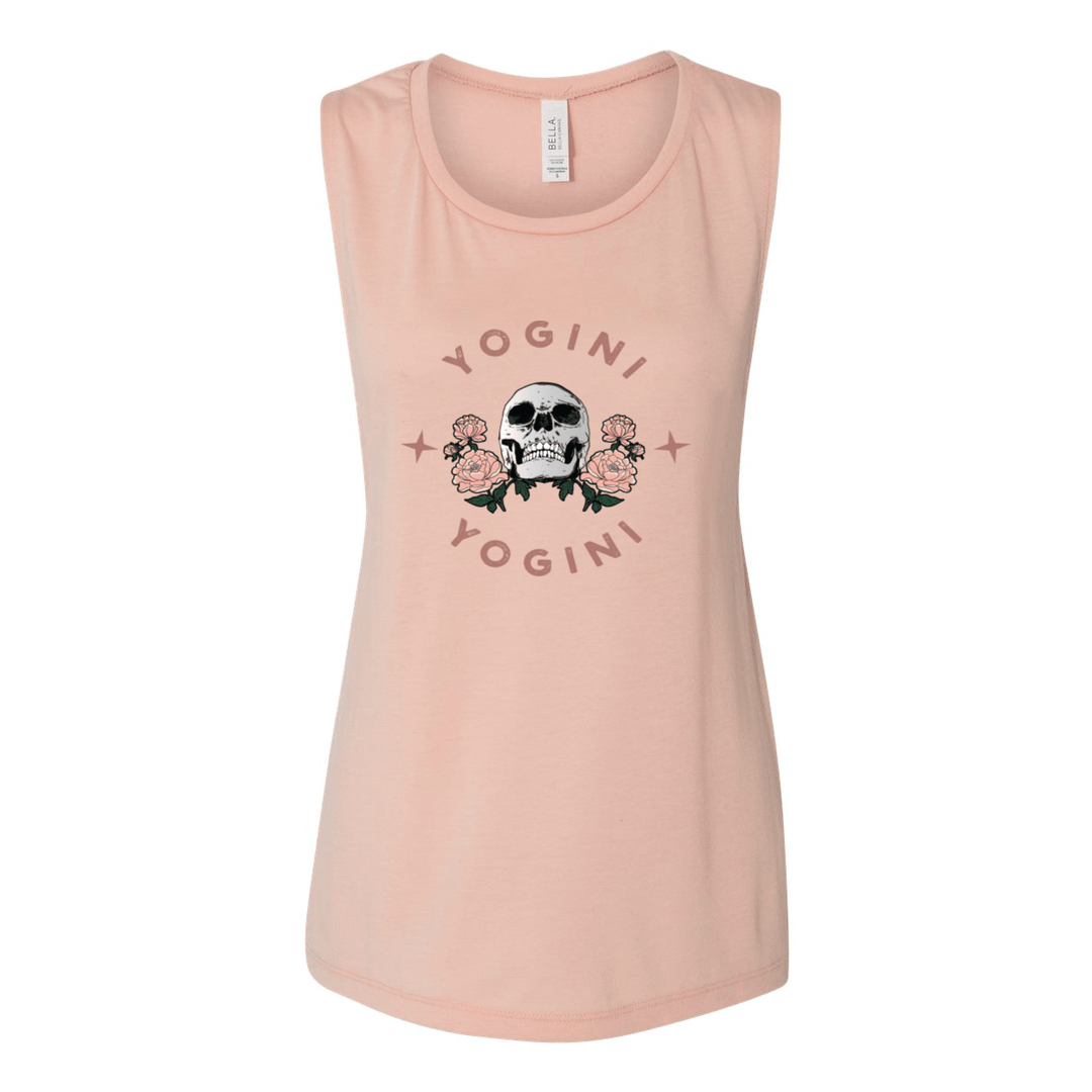 Peach muscle tank top with the words "Yogini" in a semi circle on the top and bottom of the design. There is a skull in the middle of the tank top.