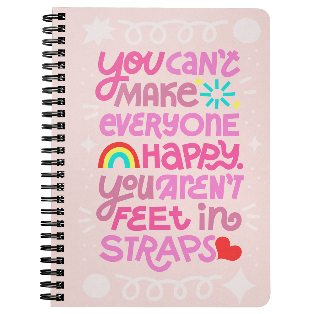 Spiralbound light pink color notenook that says "You can't make everyone happy. You aren't fee in straps."