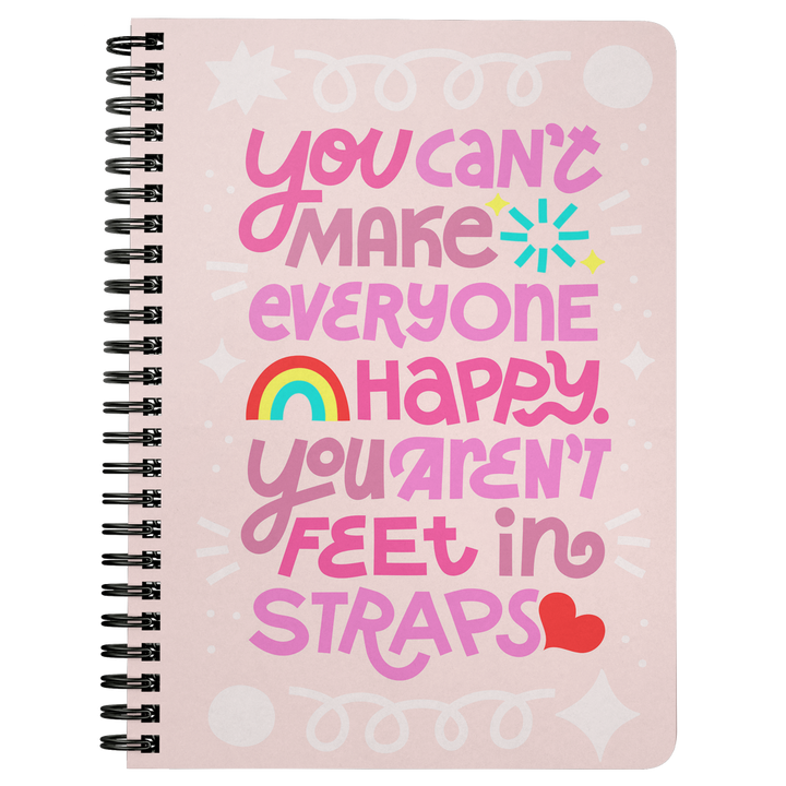 Spiralbound light pink color notenook that says "You can't make everyone happy. You aren't fee in straps."