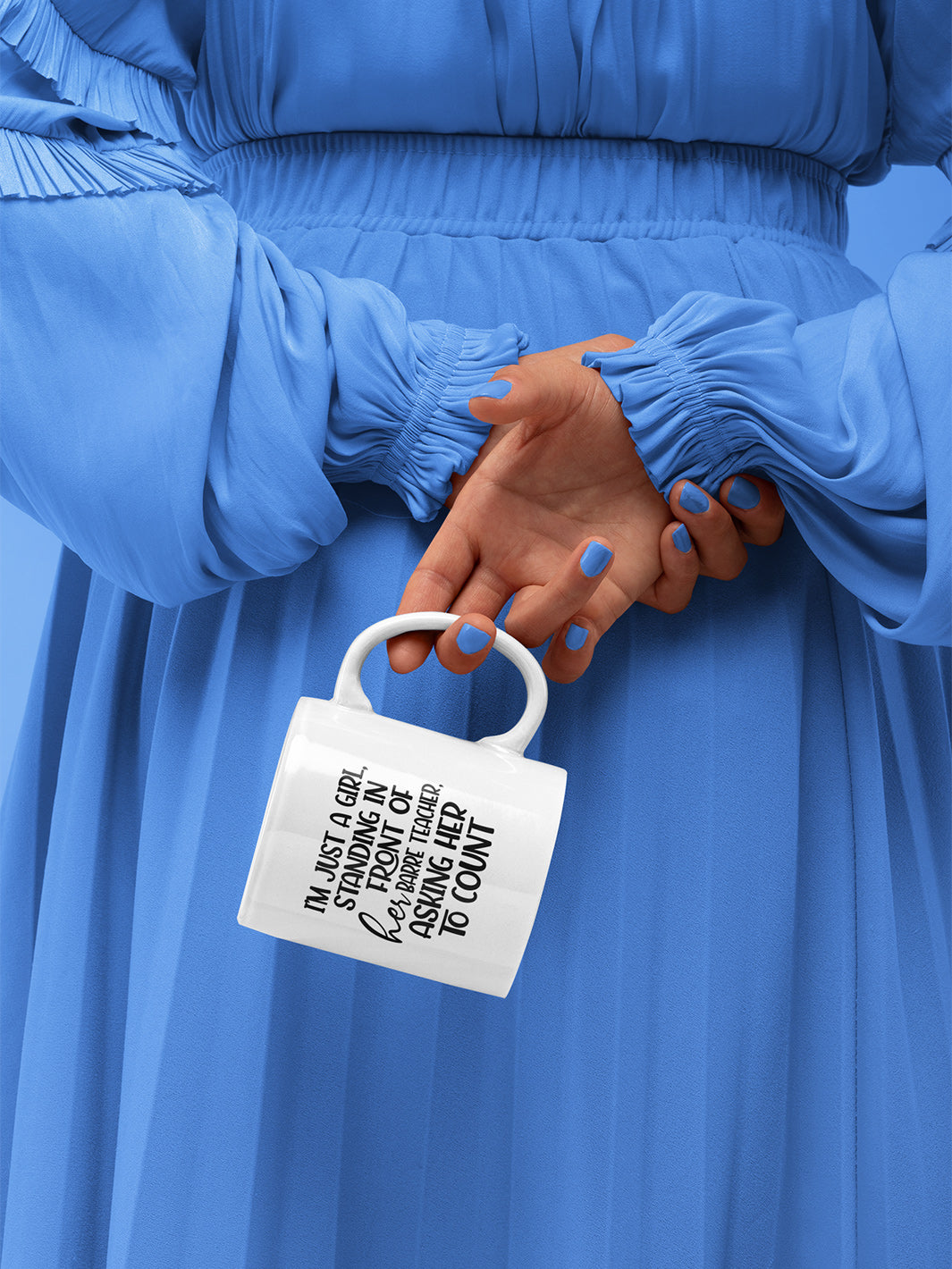 Woman holding a 11oz white coffee mug that says "I'm Just A Girl, Standing in Front Of Her Barre Teacher, Asking Her To Count"