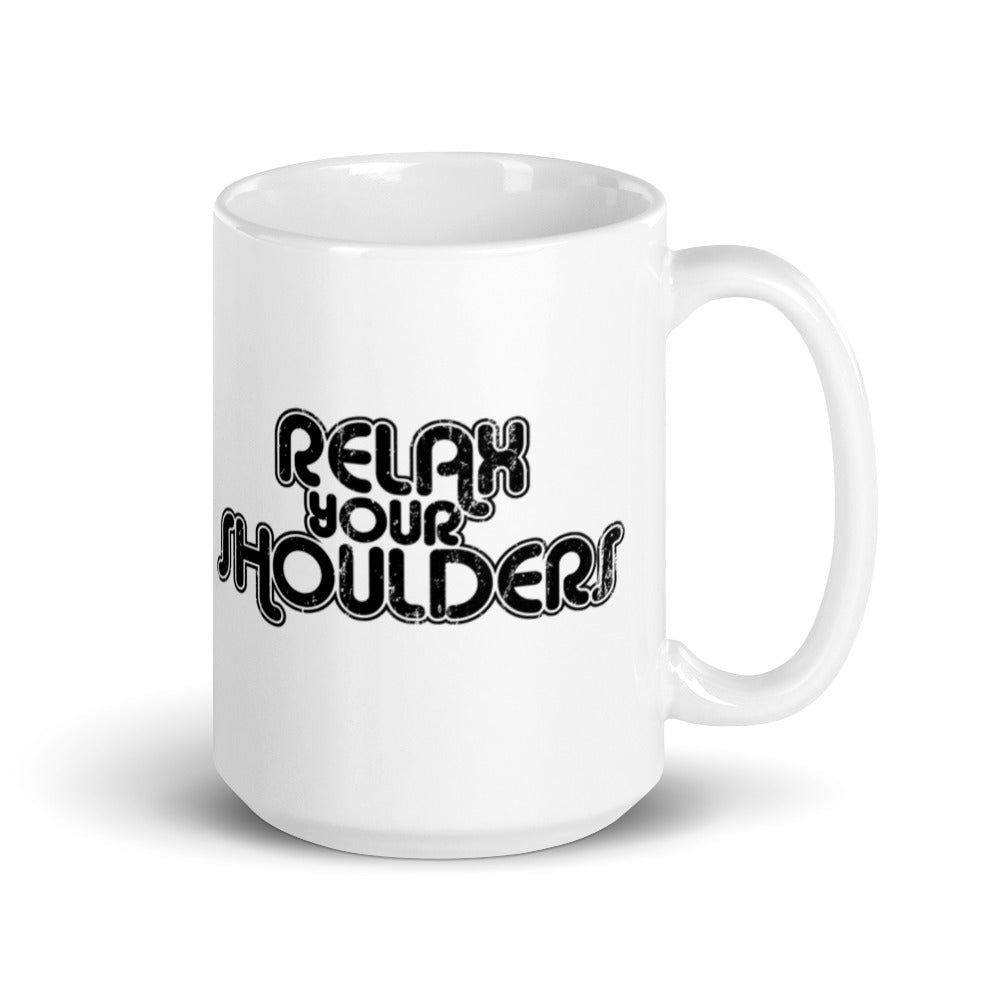 15oz white coffee mug that says "Relax Your Shoulders" in black retro font