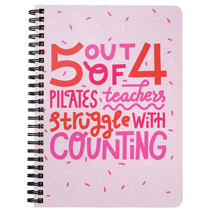 Pink spiralbound journal that says "5 out of 4 Pilates teachers struggle with counting"