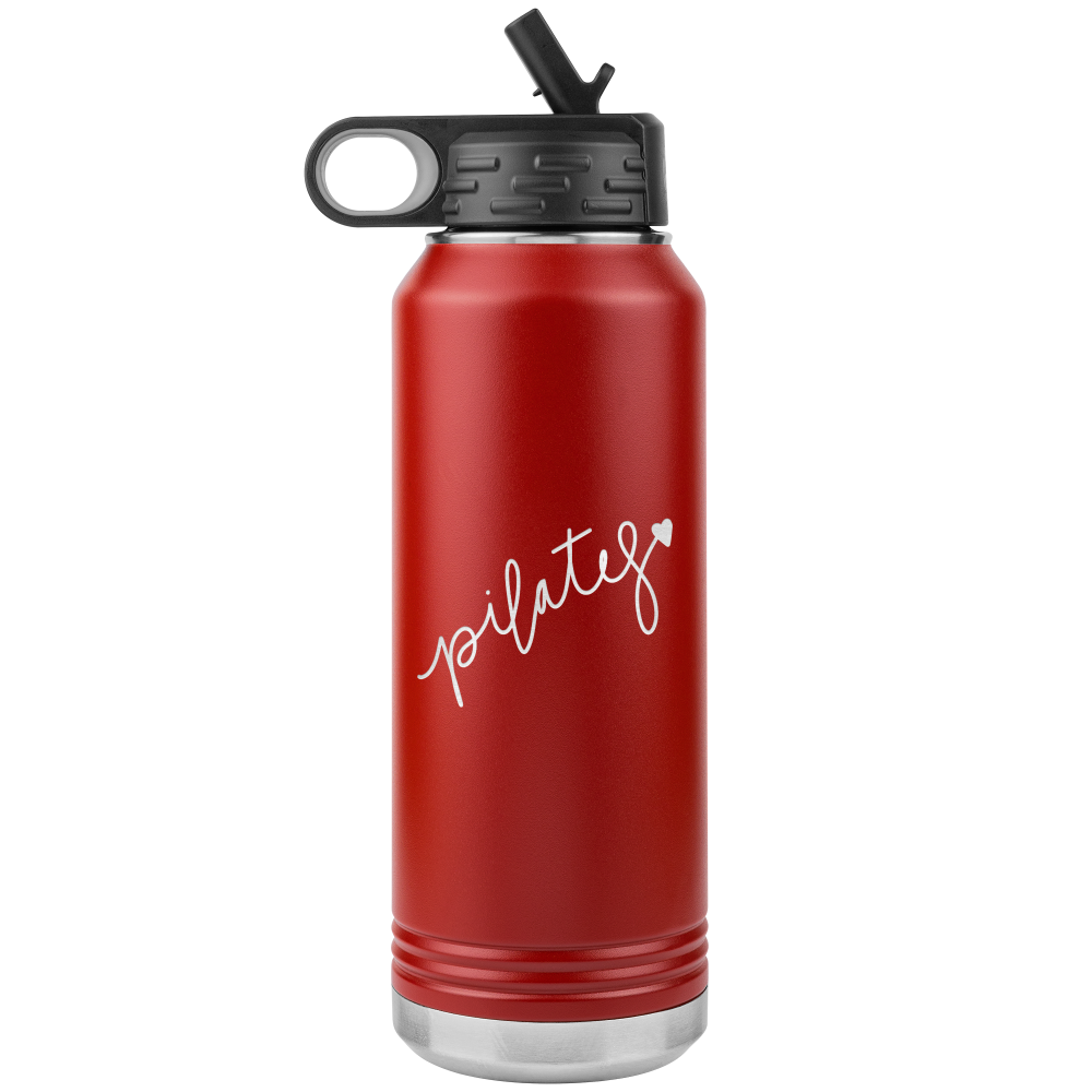 32 oz red water bottle that has the words Pilates laser etched on one side, with a heart at the end of the word "Pilates"