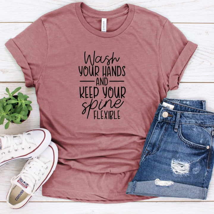 Mauve Unisex Crewneck t-shirt that says "wash your hands and keep your spine flexible" in black text