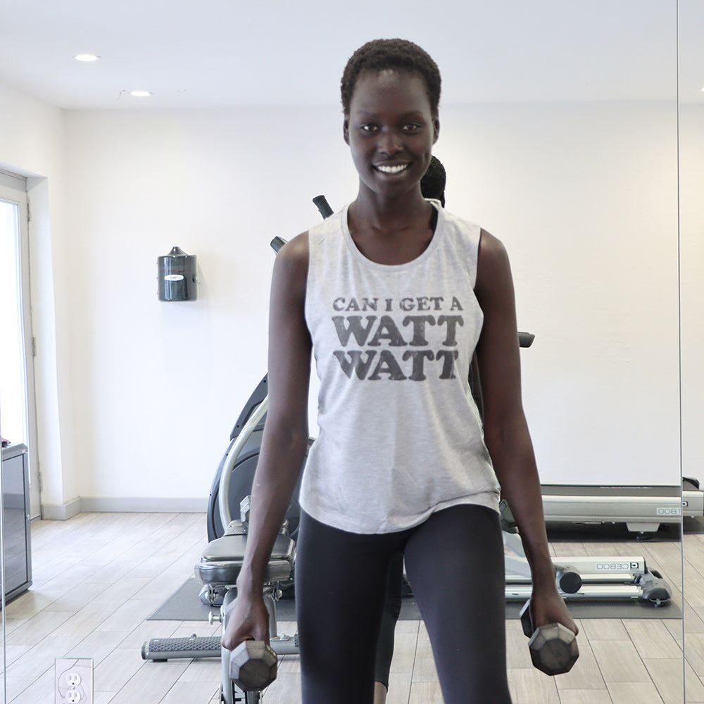 Woman wearing a grey muscle tank top that says Can I get A Watt Watt?
