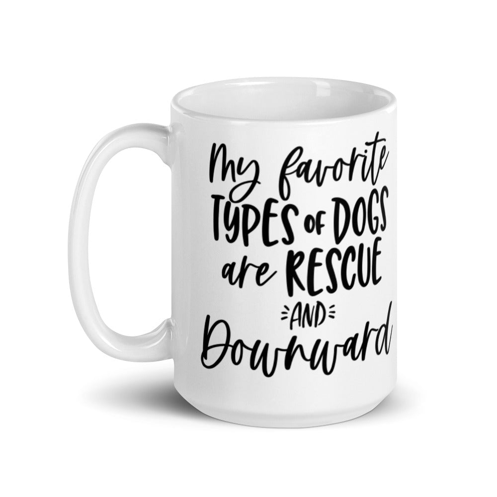 15oz white coffee mug that says "my favorite types of dogs are rescue and downward" in black text that is script and non script.