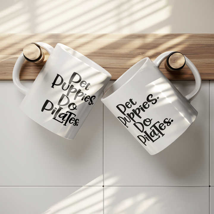 Pet_Puppies_Do_Pilates_11oz_Mug_Lifestyle_Hanging_Mockup.png