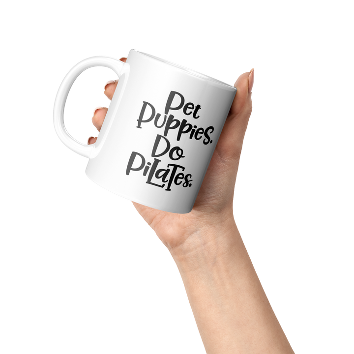 Pet_Puppies_Do_Pilates_11oz_Mug_Lifestyle_Raised_Hand_LH_Mockup.png