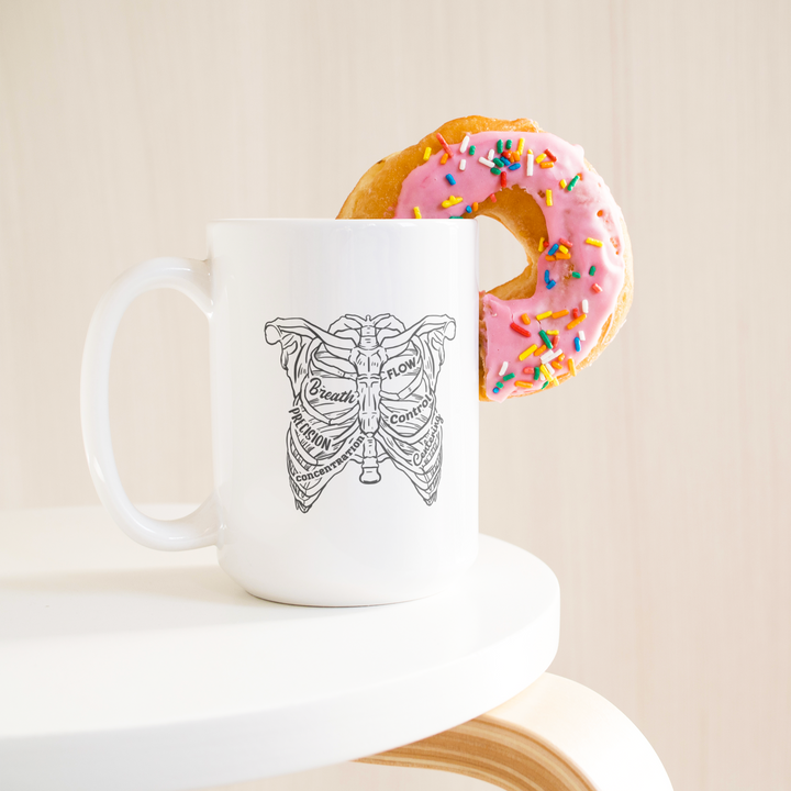 Piltes_Ribs_15ozWhiteMugLifetsyleDonutLH_Mockup.png