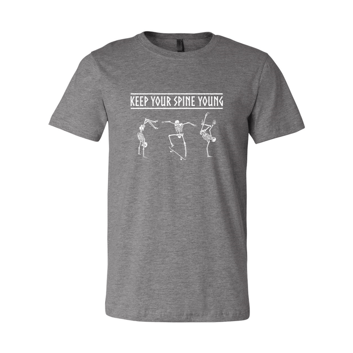 A deep heather grey unisex crewneck t-shirt that says "Keep Your Spine Young" in white with skeletons dancing