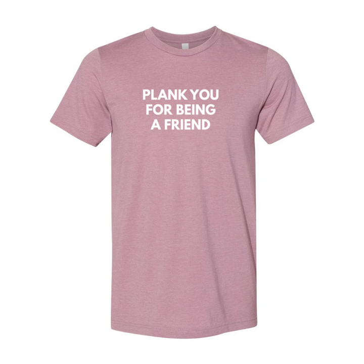 A heather orchid unisex crewneck t-shirt that says "Plank You For Being A Friend" in white text