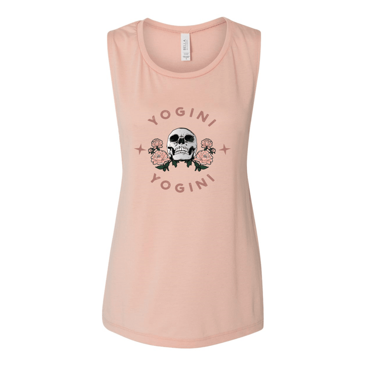 Peach muscle tank top with the words "Yogini" in a semi circle on the top and bottom of the design. There is a skull in the middle of the tank top. 