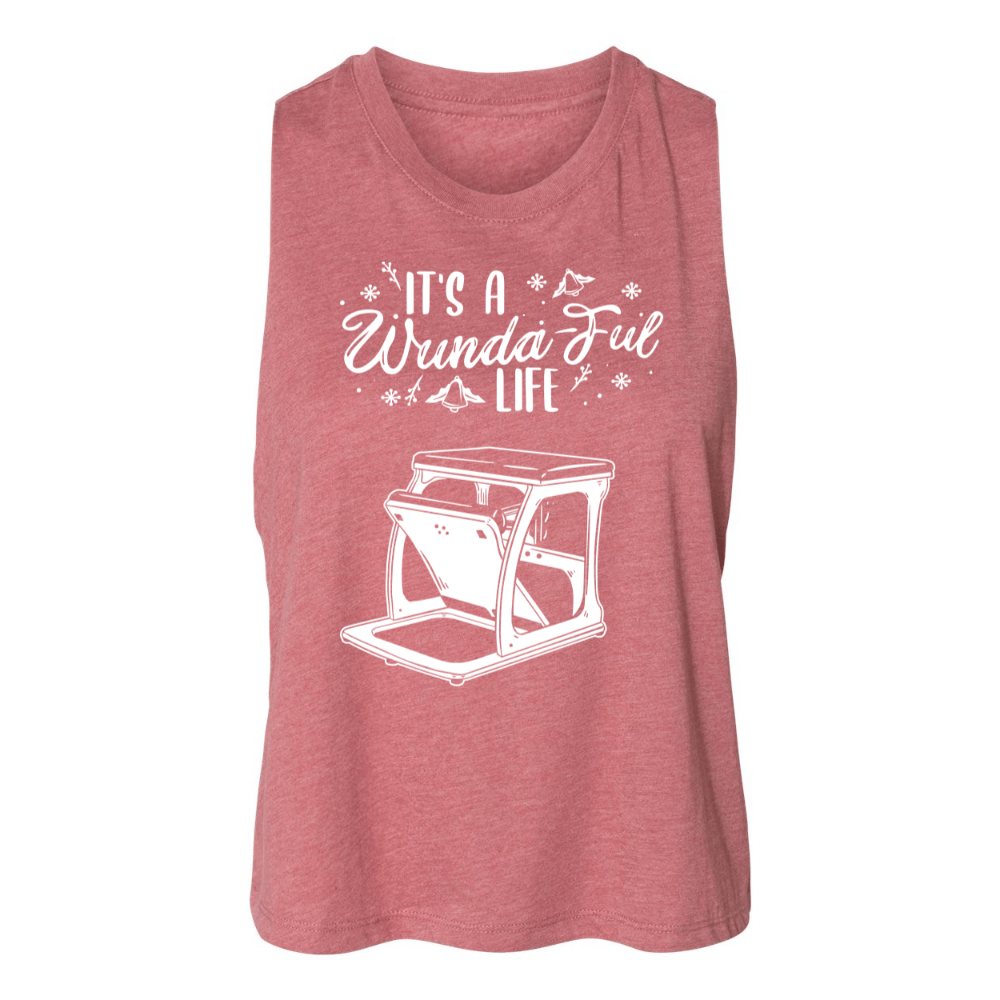 A mauve crop top that says "It's A Wundaful Life" with a wundachair in white text