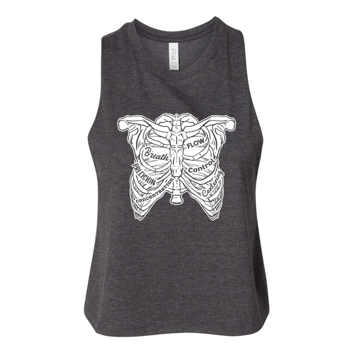 A black crop tank top that has a hand drawn rib cage on the front of the tank. The 6 Pilates Principles (flow, control, concentration, precision, breath) are incorporated into the rib design.