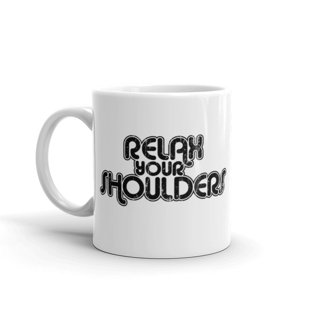 11oz white coffee mug that says "Relax Your Shoulders" in black retro font