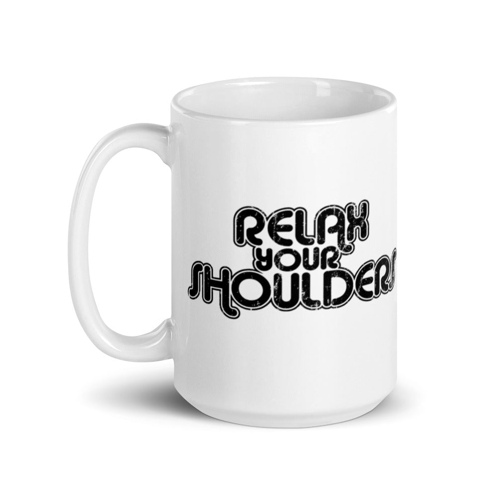 15oz white coffee mug that says "Relax Your Shoulders" in black retro font