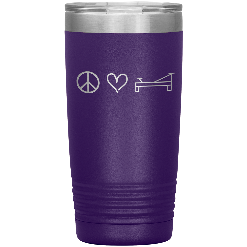 Purple 20oz coffee mug that says "peace, love, pilates" in a design laser etched on ONE side