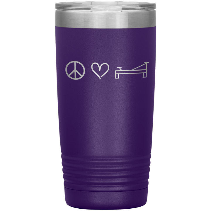 Purple 20oz coffee mug that says "peace, love, pilates" in a design laser etched on ONE side