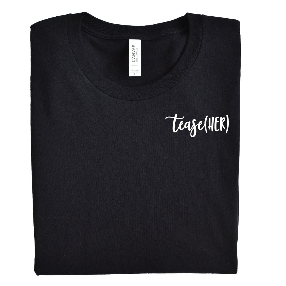heather black unisex crewneck t-shirt that says "tease(her)" in white text